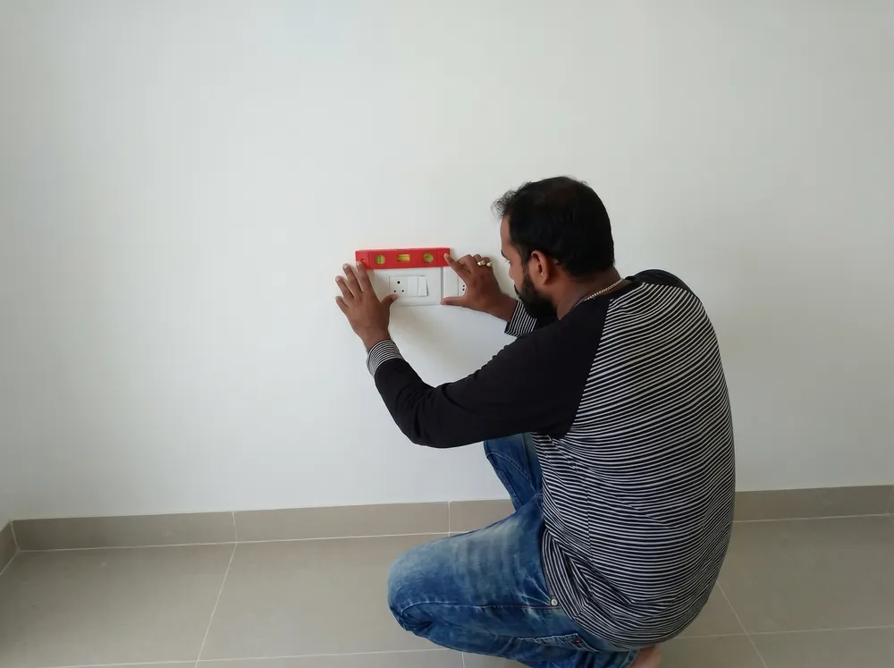 Switchboard leveling and alignment check during property audit - GharCheck